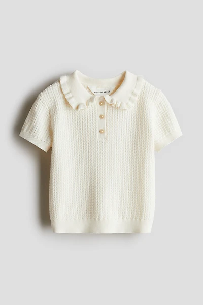 Haut en tricot torsadé de coton