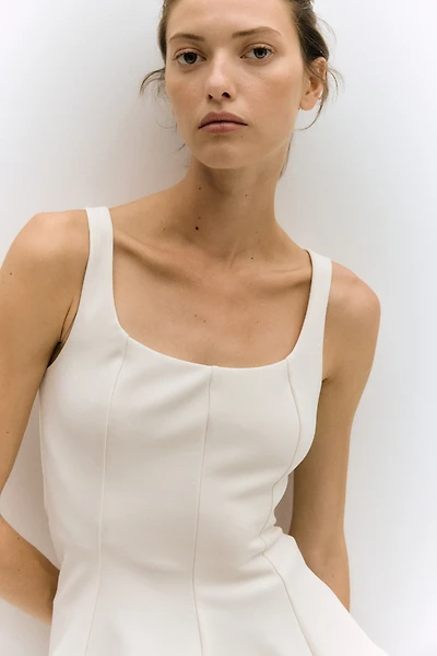 Sleeveless Peplum Top