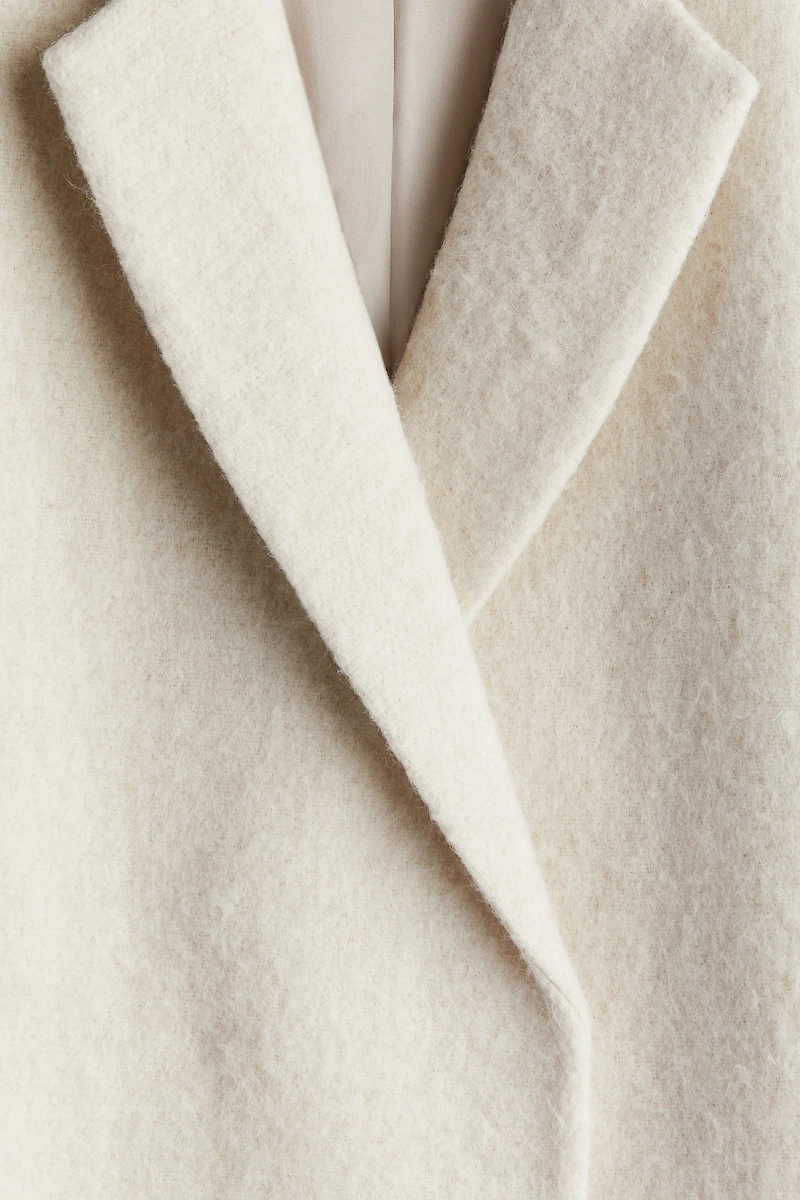 Manteau à fermeture croisée