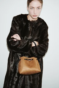 Sac à bandoulière avec cordon de serrage