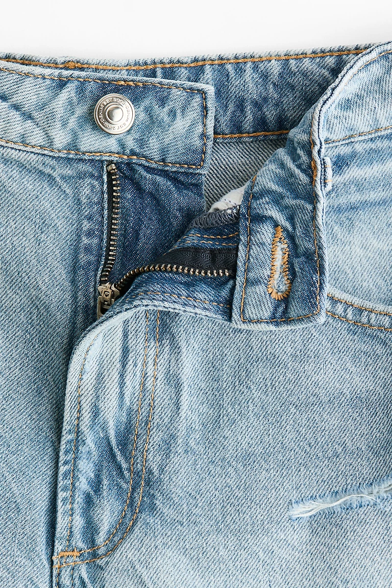 Short en denim à effet usé