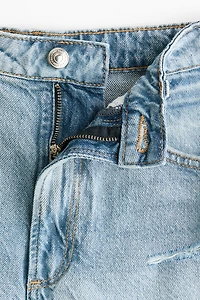 Short en denim à effet usé