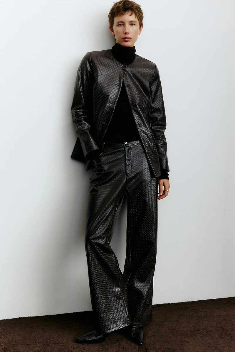 Pantalon en tissu enduit