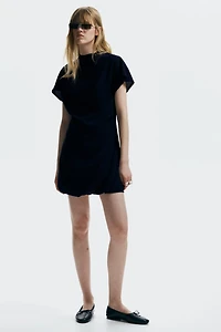 Robe à effet drapé col cheminée