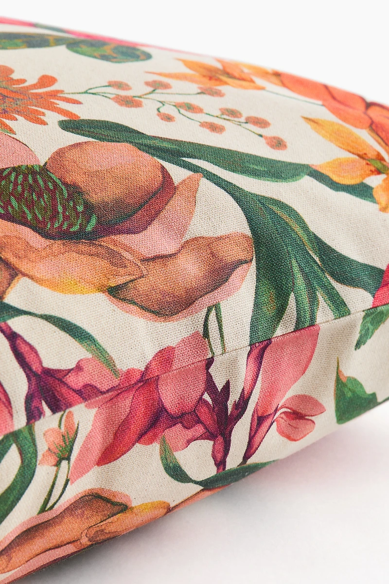 Housse de coussin à motif