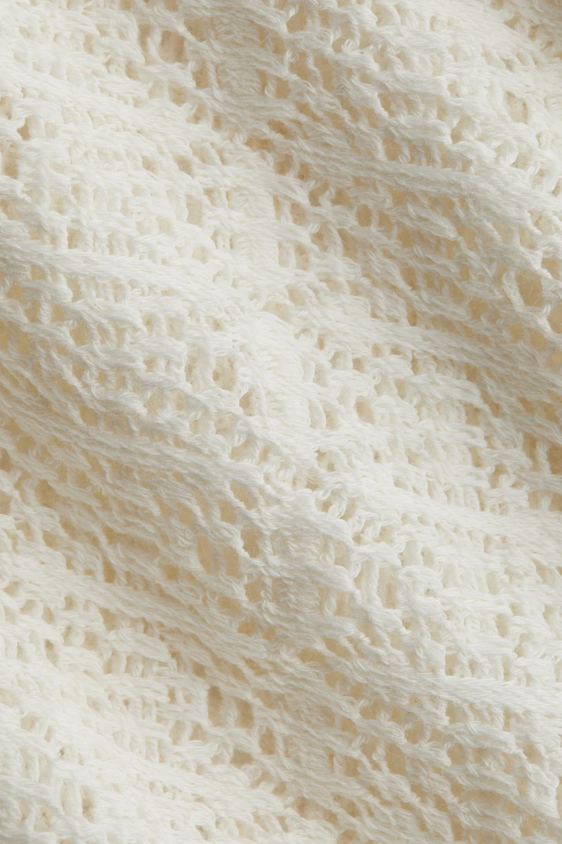 Haut en tricot façon dentelle