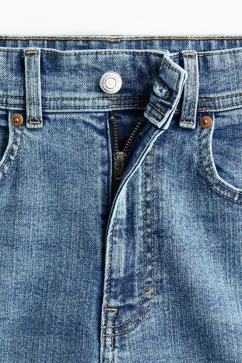 Jean ample à la cheville taille haute