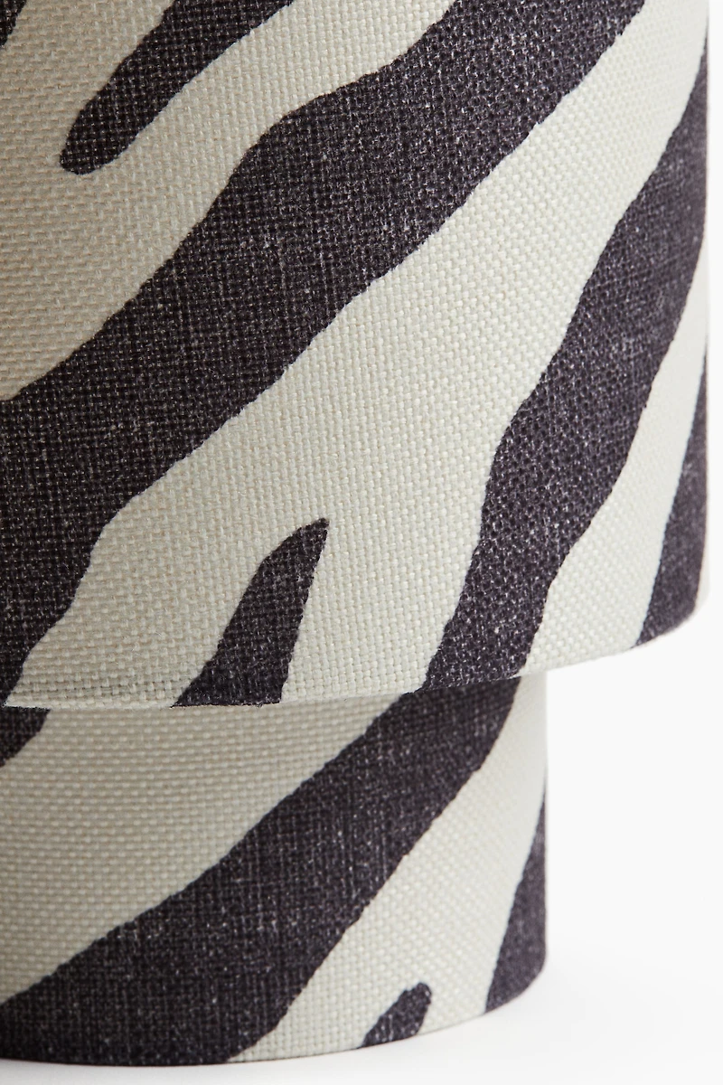 Small fabric-covered table lamp