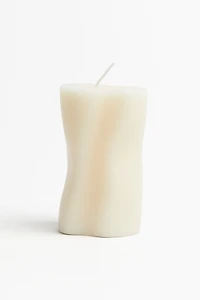 Bougie pilier asymétrique