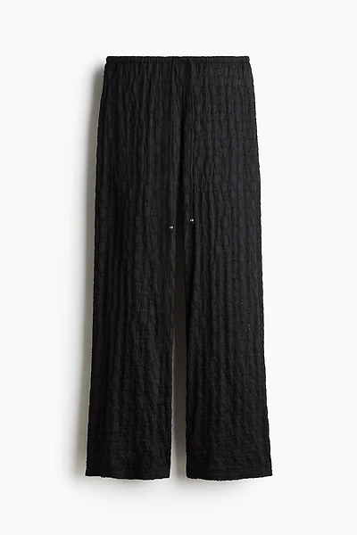Pantalon façon dentelle avec cordon de serrage