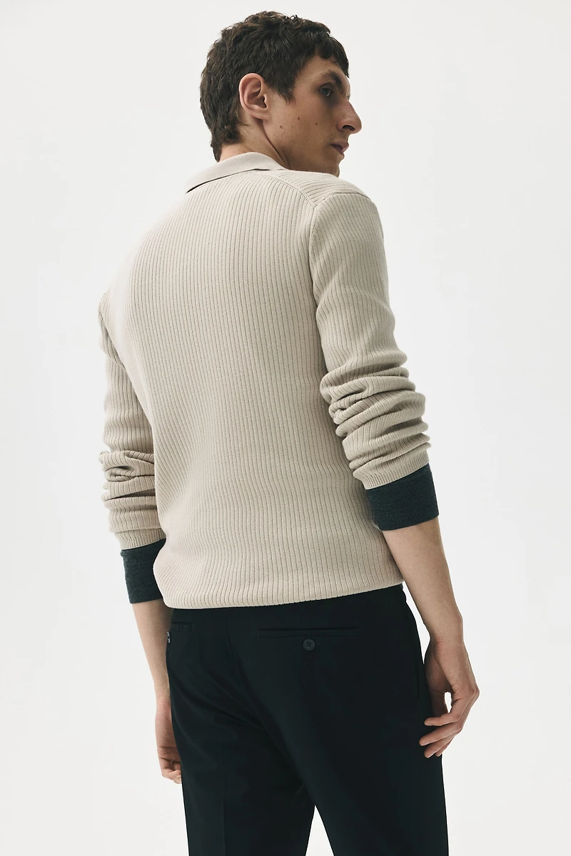 Polo près du corps en tricot côtelé