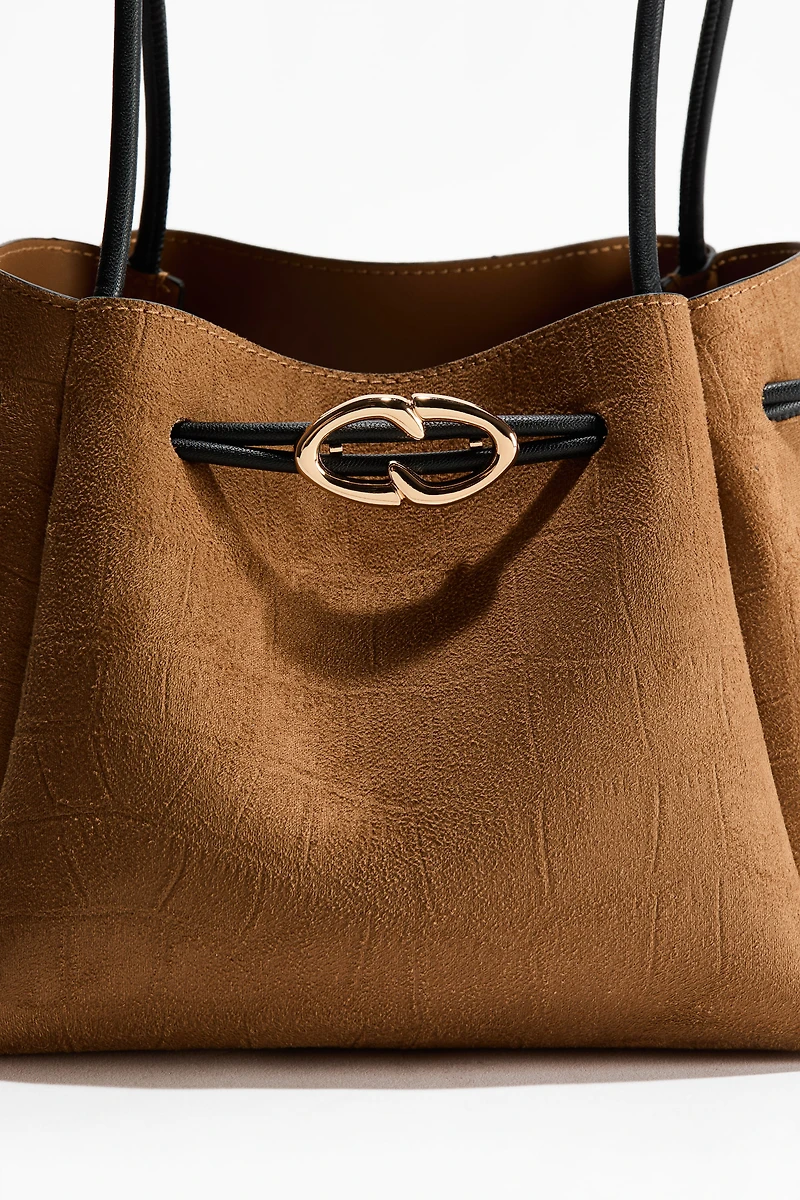 Sac à bandoulière avec cordon de serrage