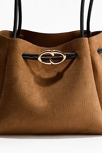 Sac à bandoulière avec cordon de serrage