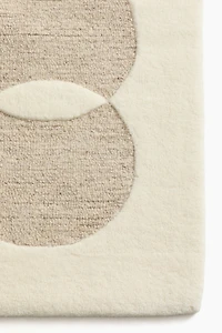 Tapis en laine bouclée