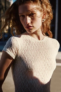 Maillot string en jersey à l’aspect dentelle