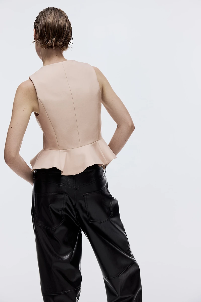 Chandail sans manches avec encolure en V et basque