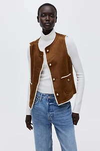 Veste sans manches doublée de tissu peluche