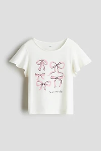 Haut imprimé avec manches à volants