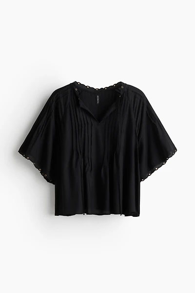 Blouse à plis nervure