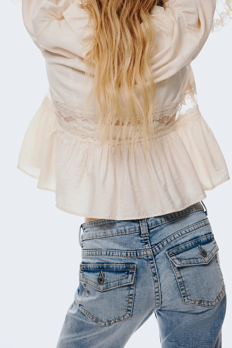 Jean taille basse évasé