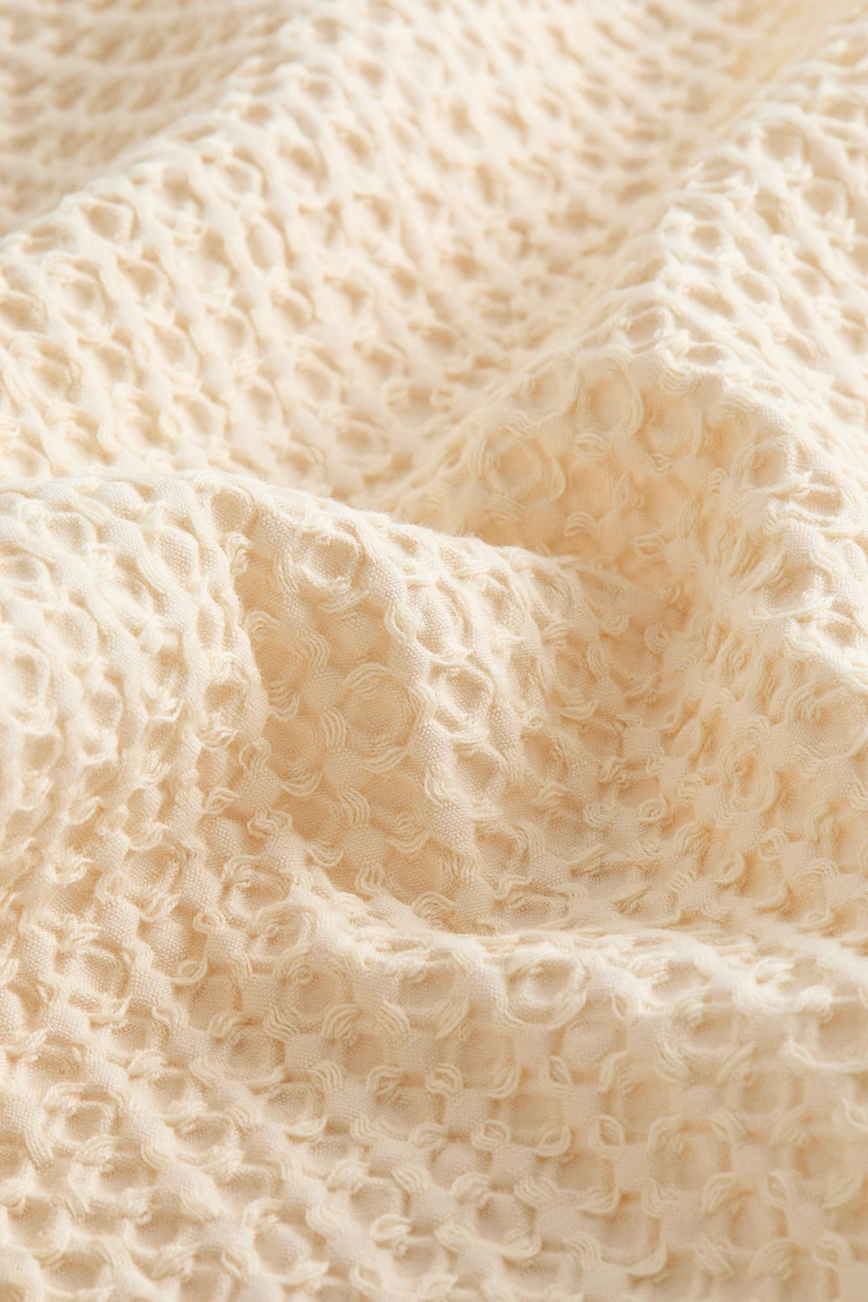 Serviette de bain gaufrée