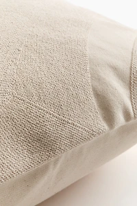 Housse de coussin brodée