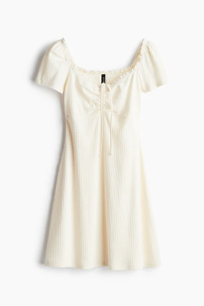 Lace-Trimmed Dress with Flared Skirt