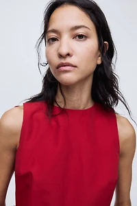 Haut péplum avec détail à nouer