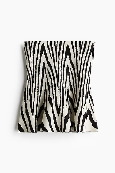 Haut péplum en tricot jacquard