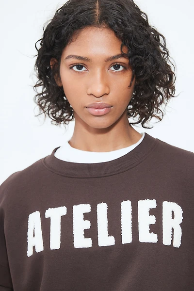 Sweatshirt with Text Motif