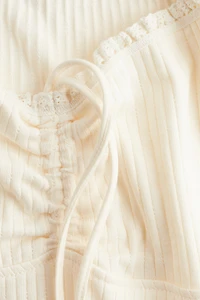 Lace-Trimmed Dress with Flared Skirt