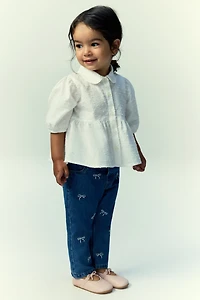 Jean avec détails brodés