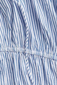 Blouse en popeline avec cordons de serrage
