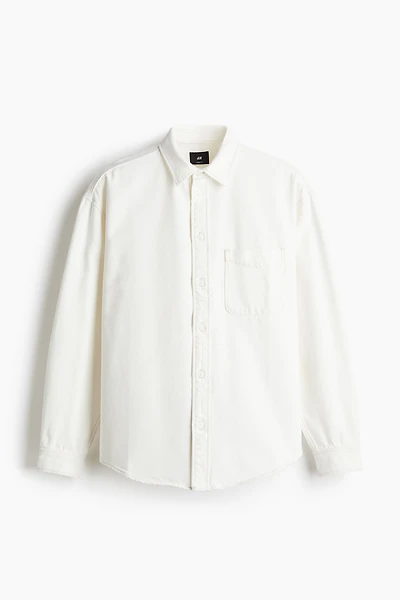 Chemise flottante en denim