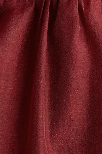 Robe à manches papillon