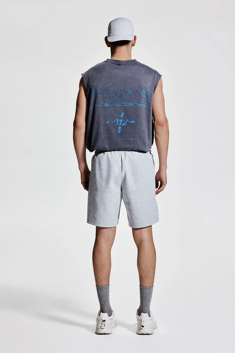 Mid-Length Sports Shorts with DryMove™