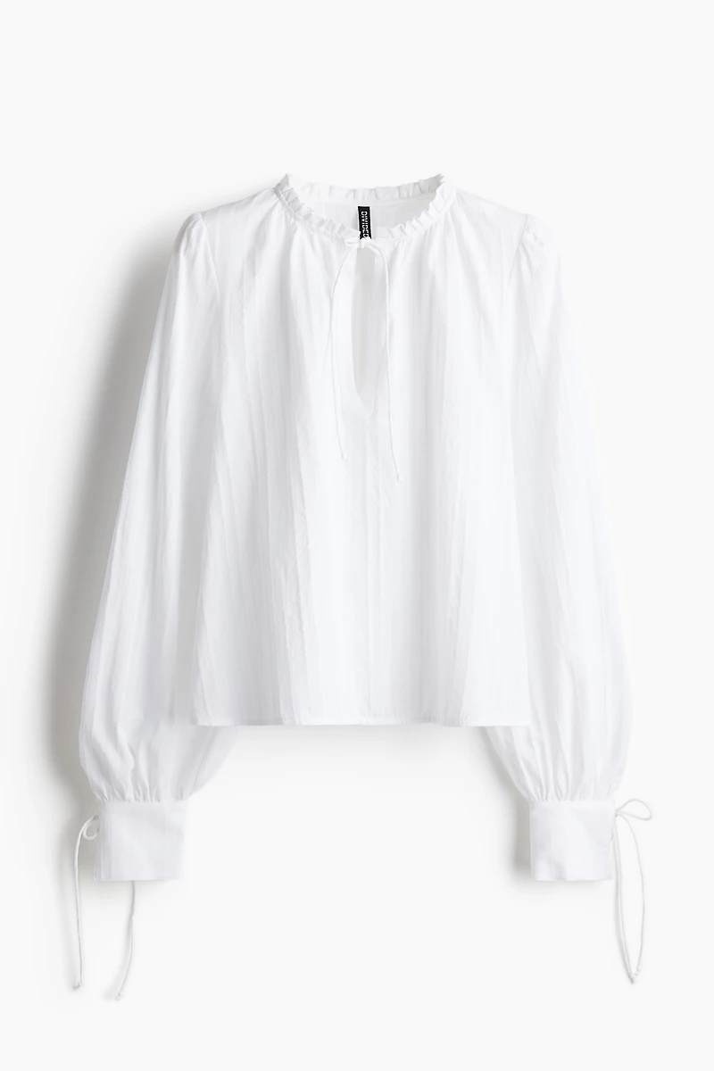 Blouse en coton avec détails à nouer