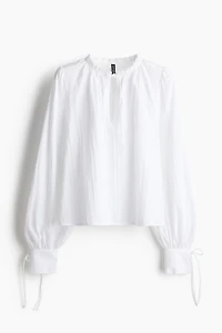 Blouse en coton avec détails à nouer