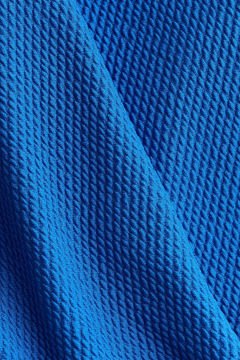 Maillot de bain coussiné jambe échancrée