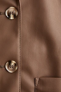 Veste en tissu enduit