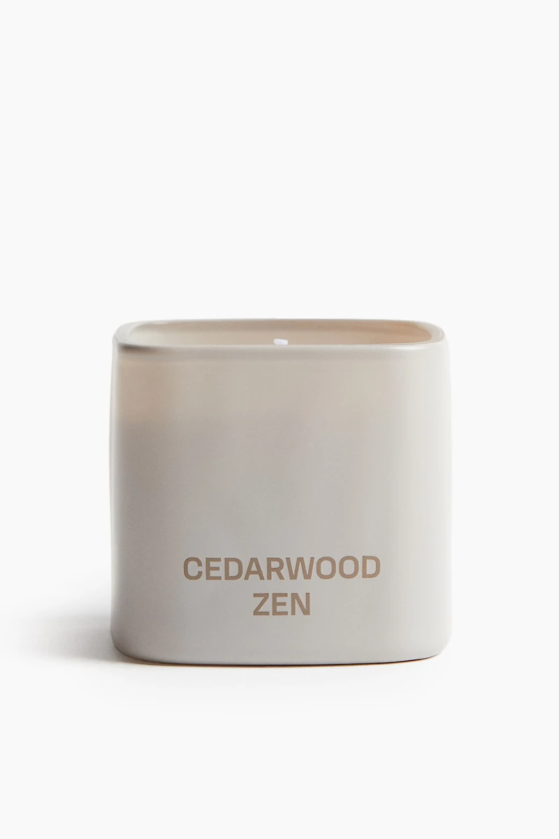 Bougie parfumée dans un pot en verre