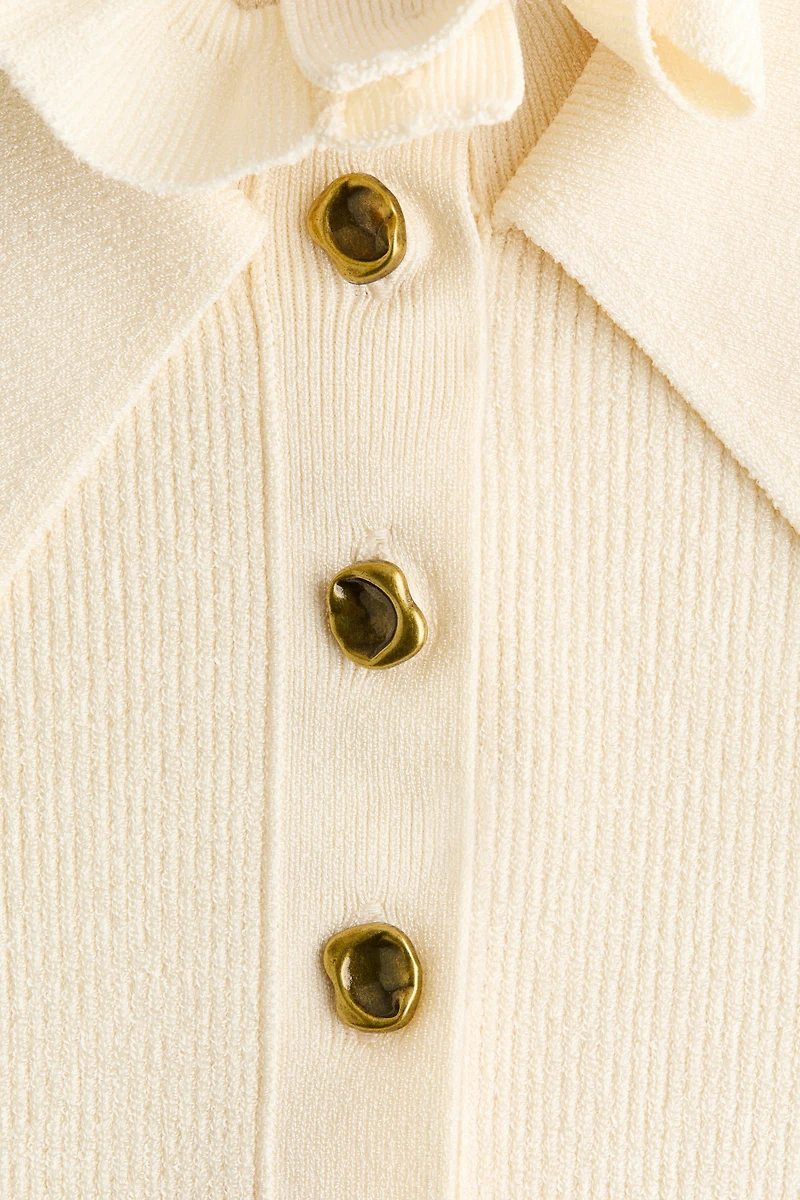 Ruffle-Trimmed Rib-Knit Top