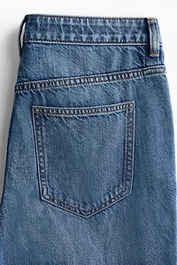 Jean classique jambes larges avec bandes latérales