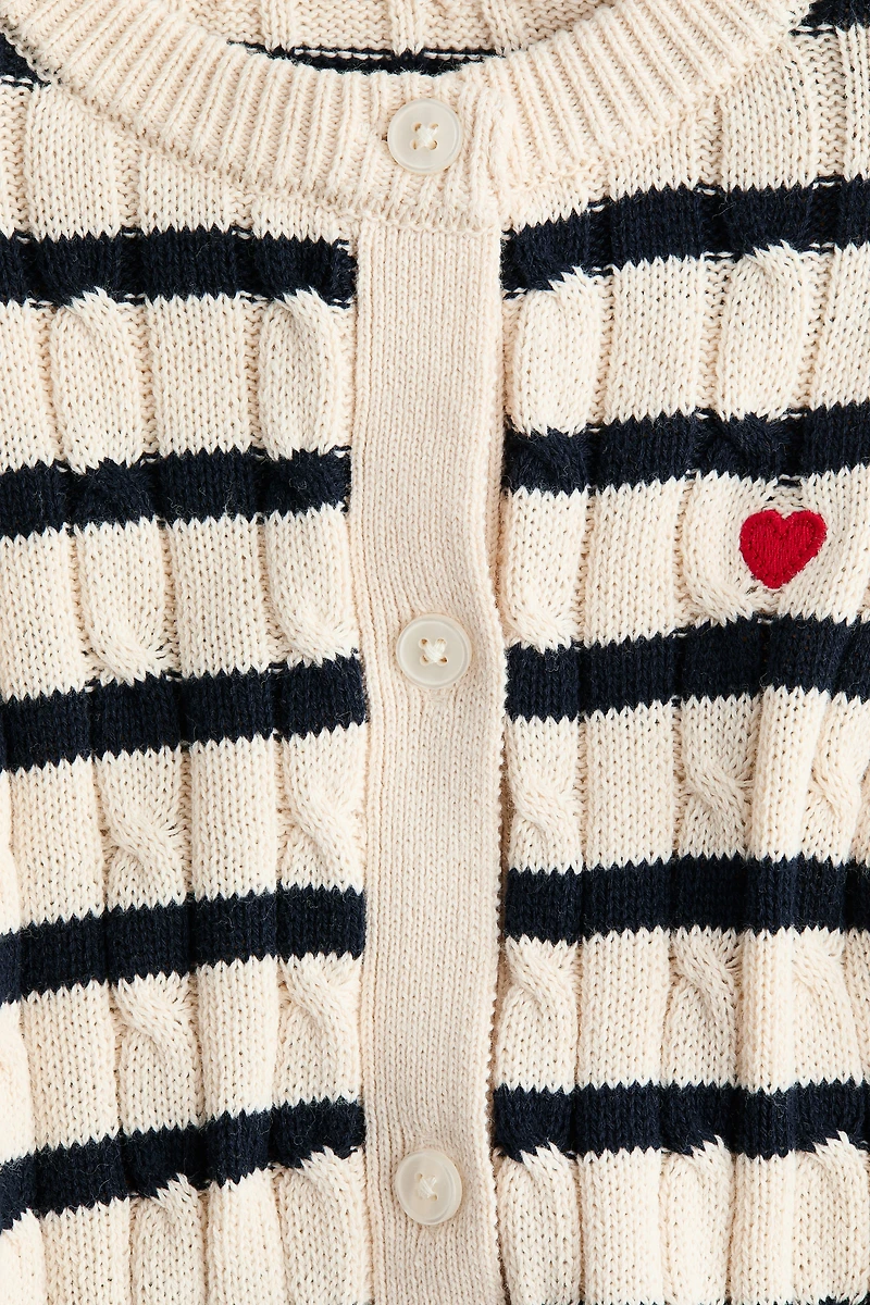 Gilet en tricot torsadé