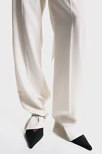 Mules à talon ornementées