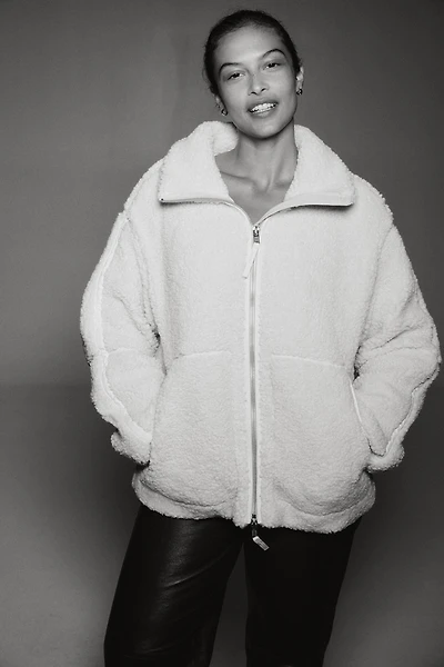 Veste flottante en tissu peluche