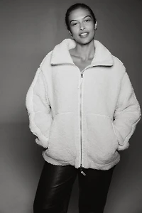 Veste flottante en tissu peluche