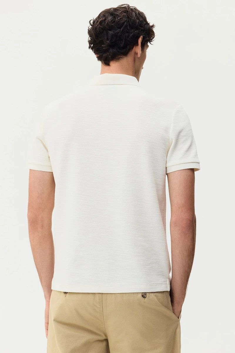 Polo près du corps en tricot jacquard