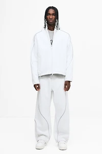 Veste à fermeture éclair ample avec capuchon