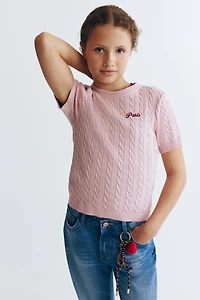 Haut en tricot torsadé